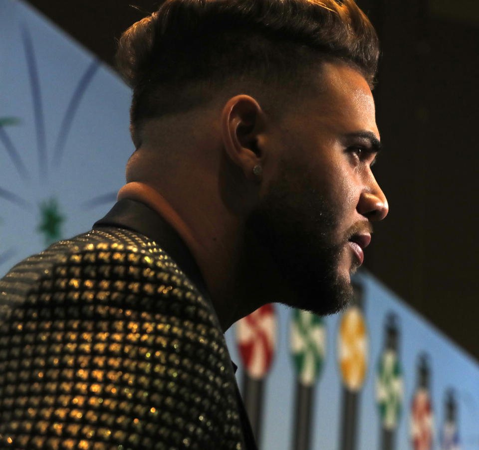 Yoan Moncada speaks with reporters during the SoxFest Chicago White Sox baseball fan convention Friday, Jan. 24, 2020, in Chicago. (Patrick Kunzer/Daily Herald via AP)