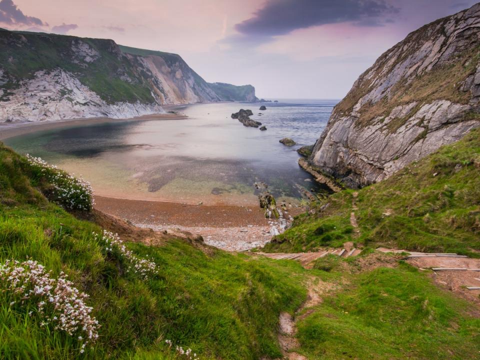 The beach is 15 minutes from the nearest car park and features both sand and pebbles (Getty Images/iStockphoto)