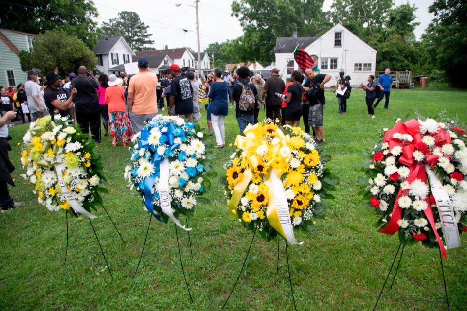 Demonstrators rally at the site where Andrew Brown Jr. was shot and killed by Pasquotank County Sheriff deputies while serving a warrant in April. Around 150 protesters called for a special prosecutor and the release of body-camera footage in the Brown.