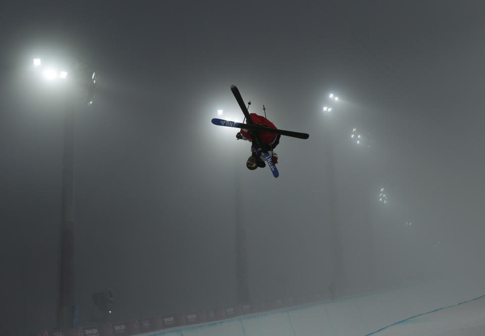 David Wise of the United States gets air during men's freestyle skiing half pipe training at the Rosa Khutor Extreme Park, at the 2014 Winter Olympics, Sunday, Feb. 16, 2014, in Krasnaya Polyana, Russia. (AP Photo/Andy Wong)