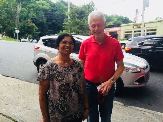 Sathi Venugopal, the mother of lohud's Swapna Venugopal Ramaswamy, with Bill Clinton in Chappaqua.