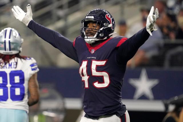 Ogbonnia Okoronkwo of the Houston Texans celebrates after knocking the ball loose against the Dallas Cowboys on Dec, 11, 2022.