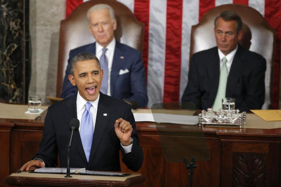 Vice President Joe Biden and House Speaker John Boehner of Ohio listen as President Barack Obama gives his State of the Union address on Capitol Hill in Washington, Tuesday Jan. 28, 2014. (AP Photo/Charles Dharapak)