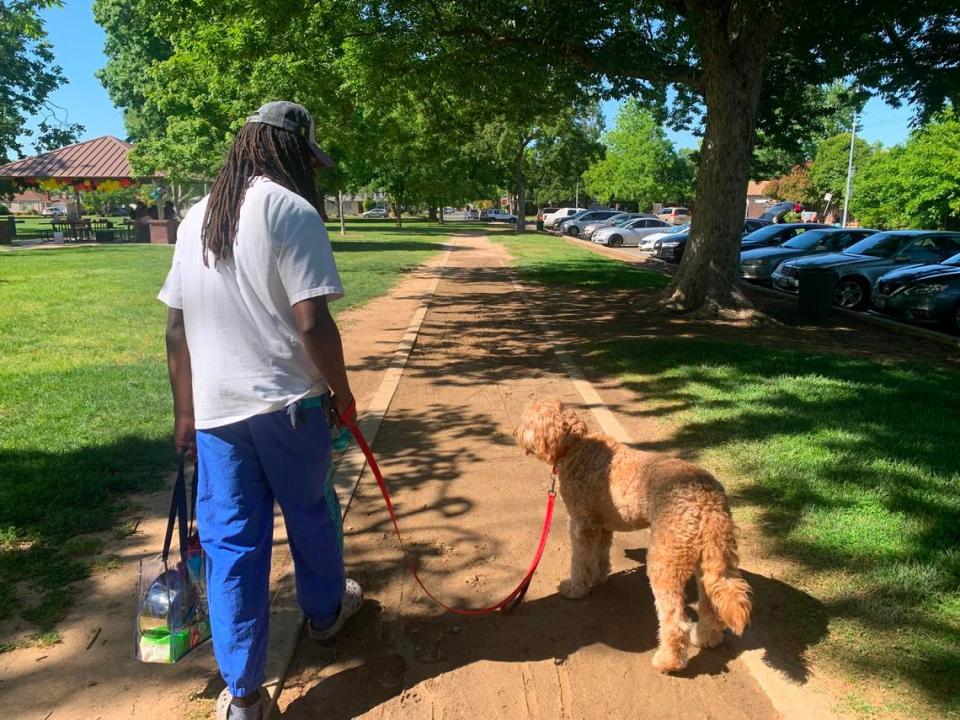 Service journalism reporter Brianna Taylor takes her Corti Brothers sandwich to Tahoe Park at 3501 59th St., Sacramento on May 13, 2023.