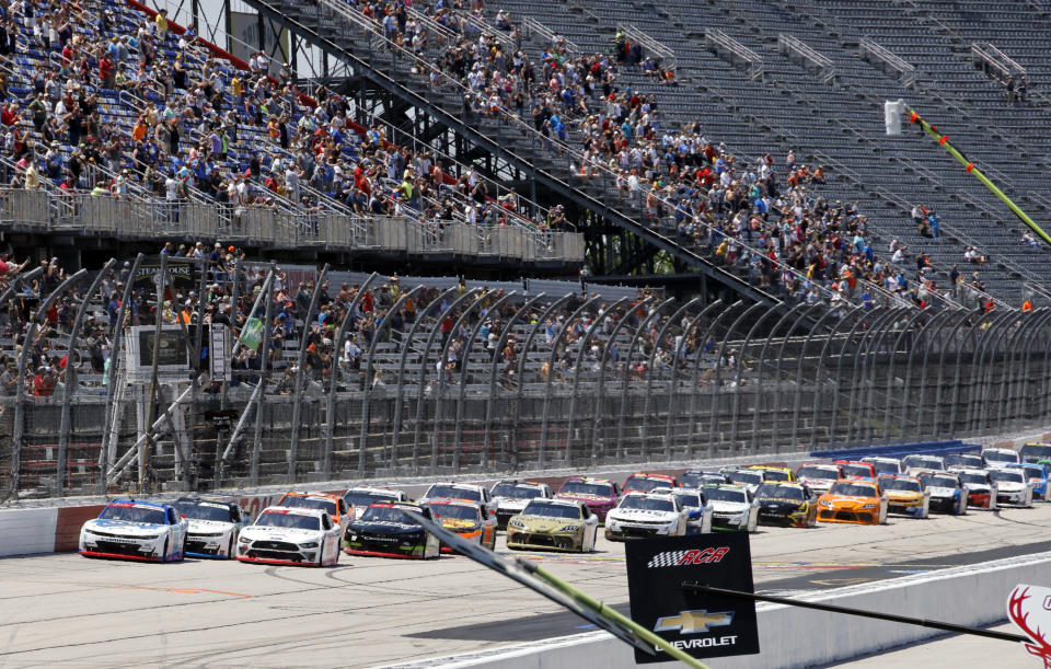 A J Allmendinger, left, leads the field at the start of the NASCAR Xfinity Series auto race at Darlington Raceway, Saturday, May 8, 2021, in Darlington, S.C. (AP Photo/Terry Renna)