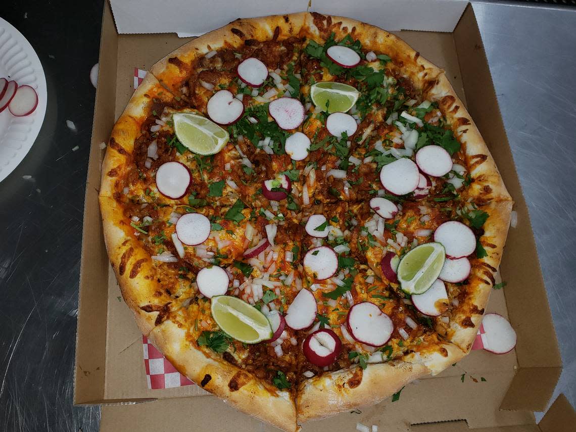 Mercy’s Pizza Taco created the “adovado” pizza, blending beans, cheese, onions, cilantro, salsa, radishes and lime on a traditional pizza crust.