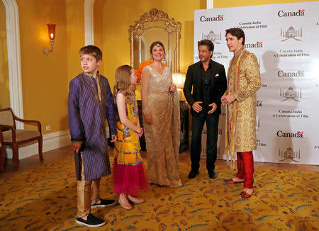 Canadian Prime Minister Justin Trudeau, his wife Sophie Gregoire Trudeau, their daughter Ella Grace and son Xavier pose with Bollywood actor Shah Rukh Khan in Mumbai, India February 20, 2018. REUTERS/Danish Siddiqui