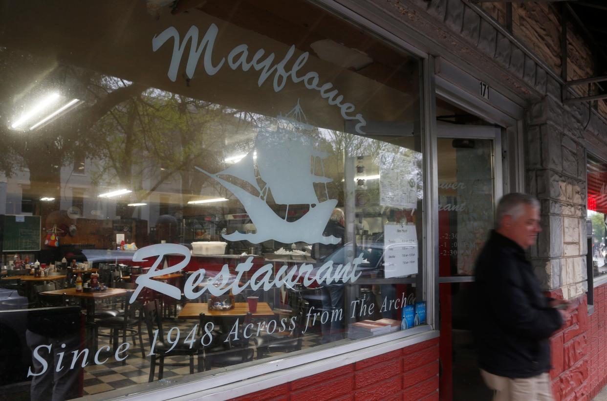 Customers leave the Mayflower after breakfast in downtown Athens, Ga., on Friday, March 10, 2023. The restaurant closed on Nov. 12 after 75 years in business.