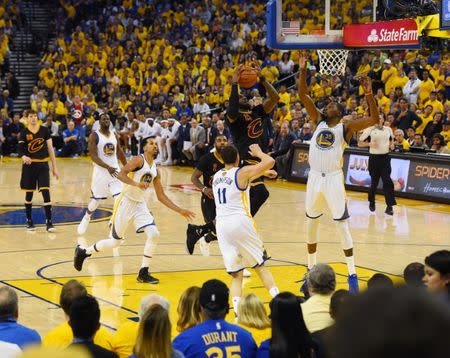 Jun 4, 2017; Oakland, CA, USA; Cleveland Cavaliers forward LeBron James (23) shoots against Golden State Warriors forward Kevin Durant (35) during the first half in game two of the 2017 NBA Finals at Oracle Arena. Mandatory Credit: Kyle Terada-USA TODAY Sports