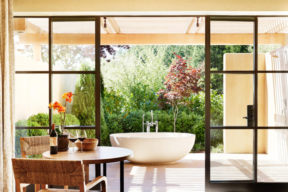 <p>At this famous wine-country escape, the Deluxe Garden Suites boast private outdoor terraces with a freestanding tub that lets you literally soak in the sun. (Photo: Auberge)</p>