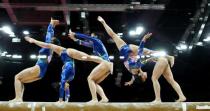 Bruna Kuroiwa Yamamoto Leal of Brazil competes in the balance beam during the women's gymnastics qualification in the North Greenwich Arena during the London 2012 Olympic Games July 29, 2012.