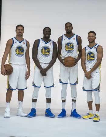 September 22, 2017; Oakland, CA, USA; Golden State Warriors guard Klay Thompson (11), forward Draymond Green (23), forward Kevin Durant (35), and guard Stephen Curry (30) during media day at Rakuten Performance Center. Mandatory Credit: Kyle Terada-USA TODAY Sports