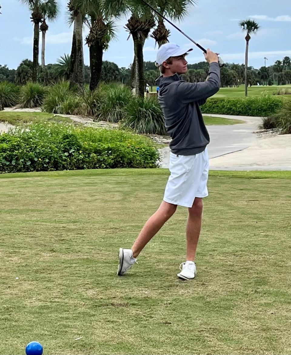 Decah McDaniel of Fernandina Beach hits his tee shot at the 10th hole in the Jacksonville Beach Varsity Invitational on Saturday at the Jacksonville Beach Golf Club.