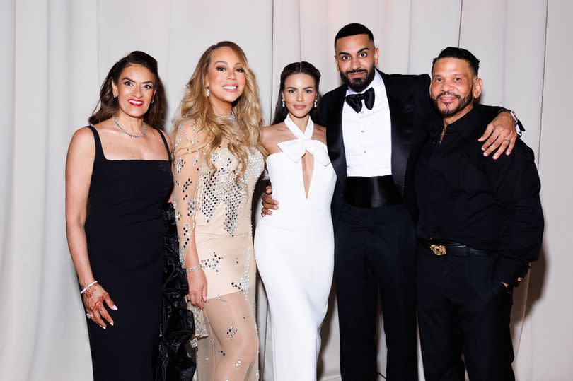 Aisha Kamani, Mariah Carey (in gold) with Nada and Umar -Credit:German Larkin