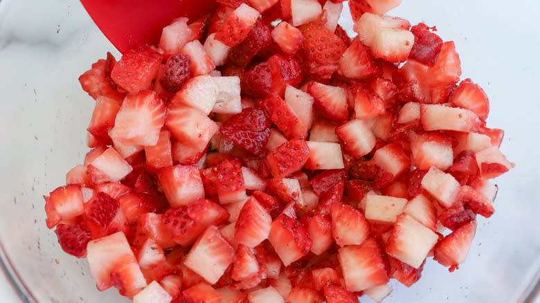 cut strawberries in a bowl