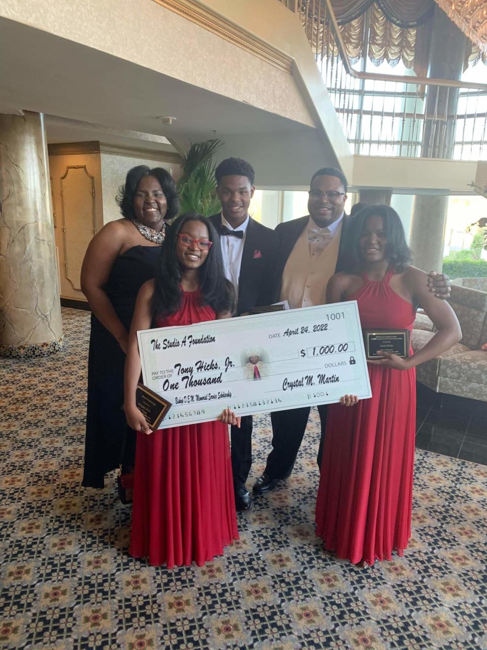 Sharnetta Hicks, Tony Hicks Jr., Tony Hicks Sr., Morgan Hicks (left) and Sanai Hicks (right). The triplets all graduated high school with impressive GPAs and went on to enroll at Spelman College and Morehouse College together, beginning on Wednesday, August 16, 2023.