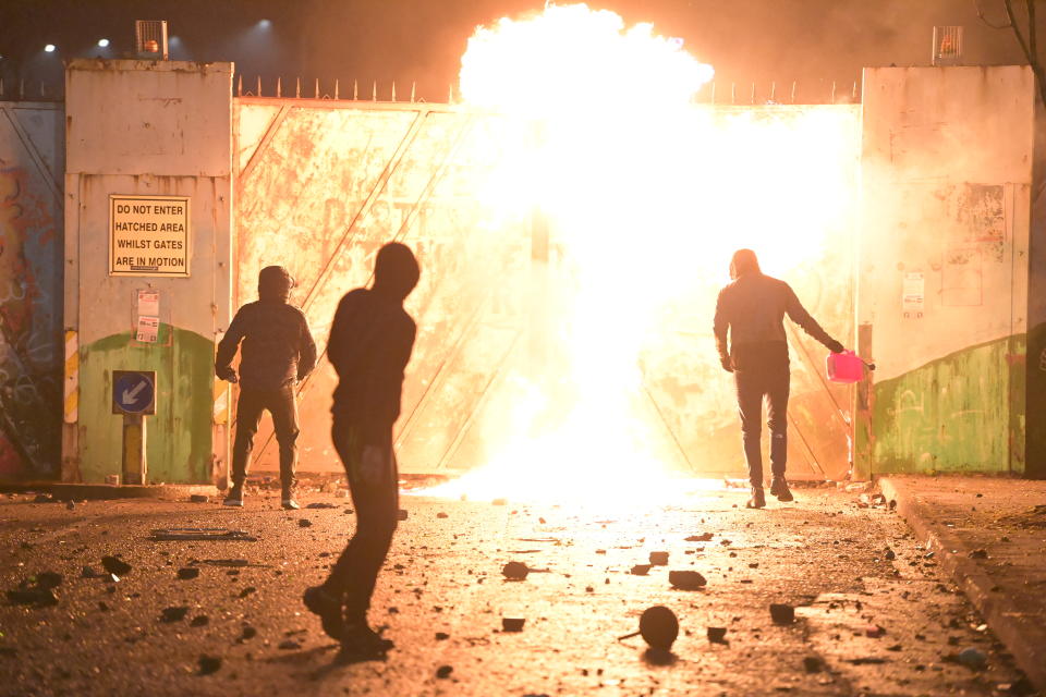 BELFAST, NORTHERN IRELAND - APRIL 07:  Fire fed by petrol burns as youths clashed c on April 7, 2021 in Belfast, Northern Ireland. Violence broke out after a Loyalist protest, with youths attacking police officers and petrol-bombing a bus. (Photo by Charles McQuillan/Getty Images)