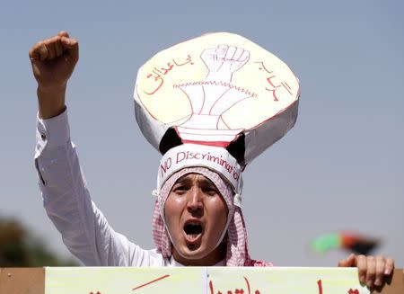 A man demonstrators from Afghanistan's Hazara minority attend a protest in Kabul, Afghanistan July 23, 2016. REUTERS/Omar Sobhani