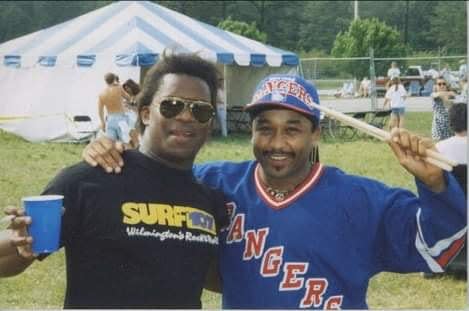 Wilmington radio DJ Chuck Denson, left, in 1995 with Carter Beauford of the Dave Matthews Band before a concert at the Wilmington airport.