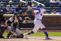 New York Mets' Francisco Lindor hits a single off Miami Marlins starting pitcher Nick Neidert during the fifth inning of a baseball game, Thursday, April 8, 2021, in New York. (AP Photo/John Minchillo)