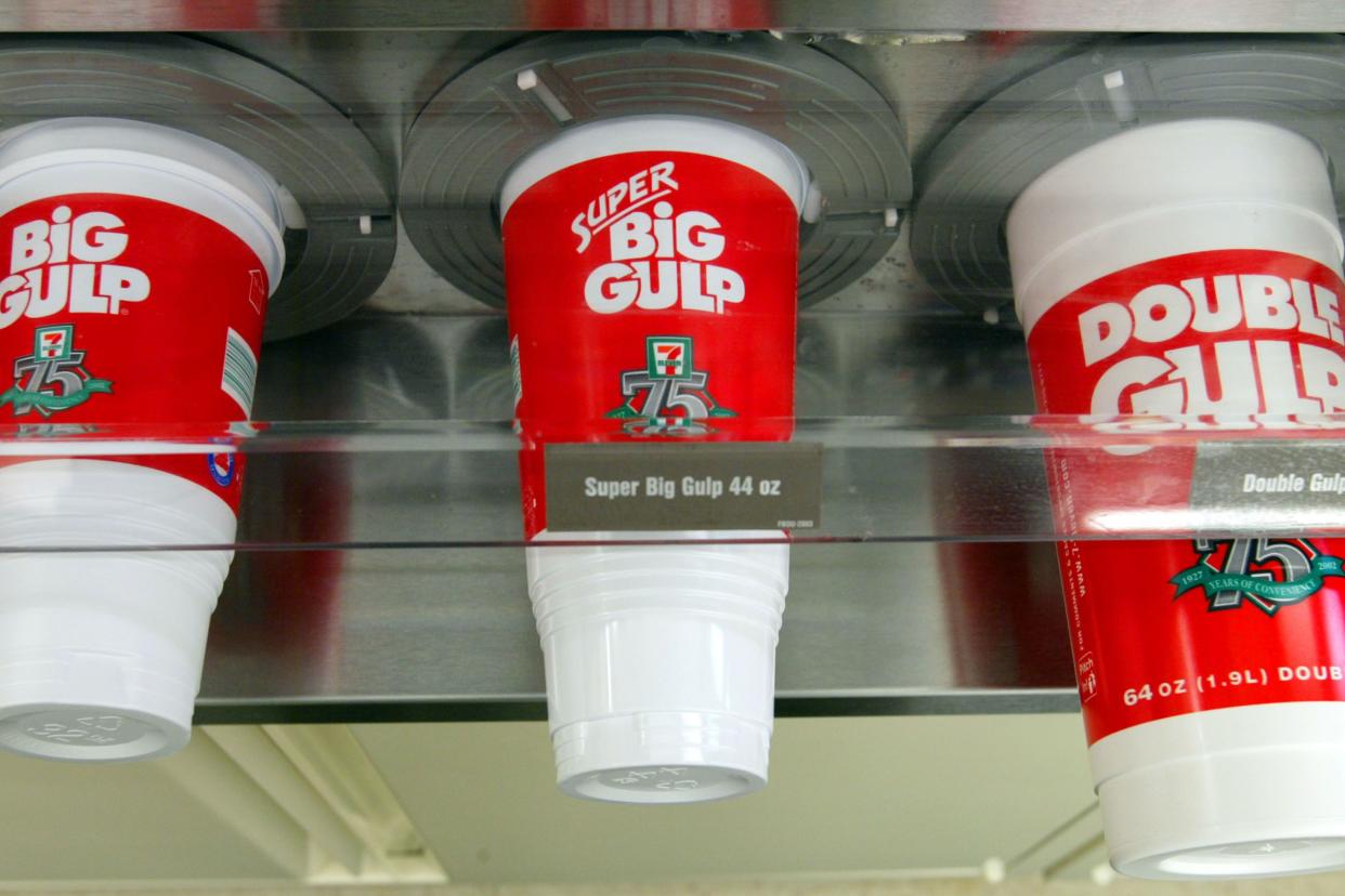 ig Gulp, Super Big Gulp and Double Big Gulp cups sit in there dispensers at a 7-Eleven store