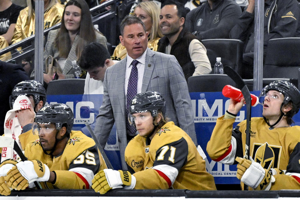 Vegas Golden Knights coach Bruce Cassidy watches during the third period of the team's NHL hockey game against the Anaheim Ducks on Thursday, April 18, 2024, in Las Vegas. (AP Photo/David Becker)