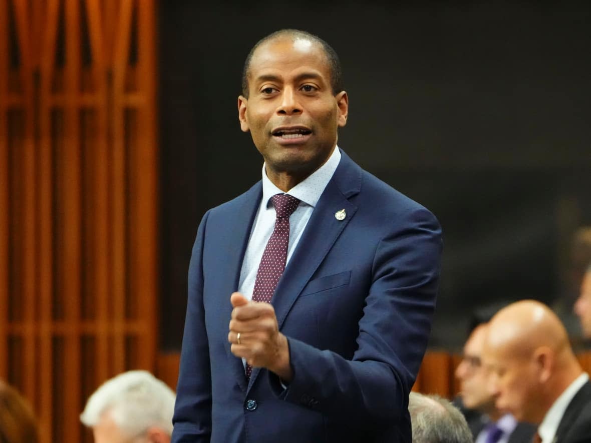 Liberal Hull-Aylmer MP Greg Fergus, parliamentary secretary to Prime Minister Justin Trudeau and President of the Treasury Board Mona Fortier, violated the Conflict of Interest and Ethics Act, says Commissioner Mario Dion.  (Sean Kilpatrick/The Canadian Press - image credit)