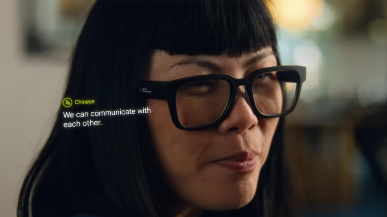  A woman wearing Google's AR translation glasses and seeing speech translated. 