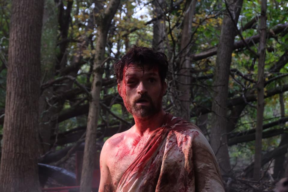 A serial killer (Josh Ruben) gets a comeuppance, Greek historical style, in the psychedelic horror film "A Wounded Fawn."