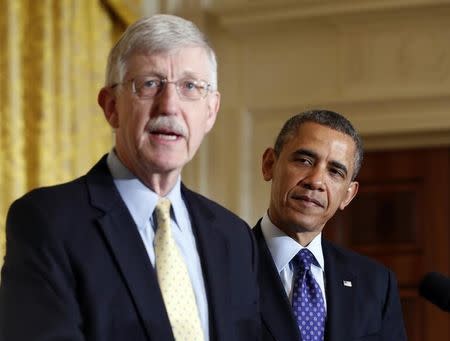 File photo of U.S. President Barack Obama being introduced by American physician-geneticist Francis Collins before his announcement of his administration's BRAIN (Brain Research through Advancing Innovative Neurotechnologies) initiative at the White House in Washington, April 2, 2013. REUTERS/Jason Reed