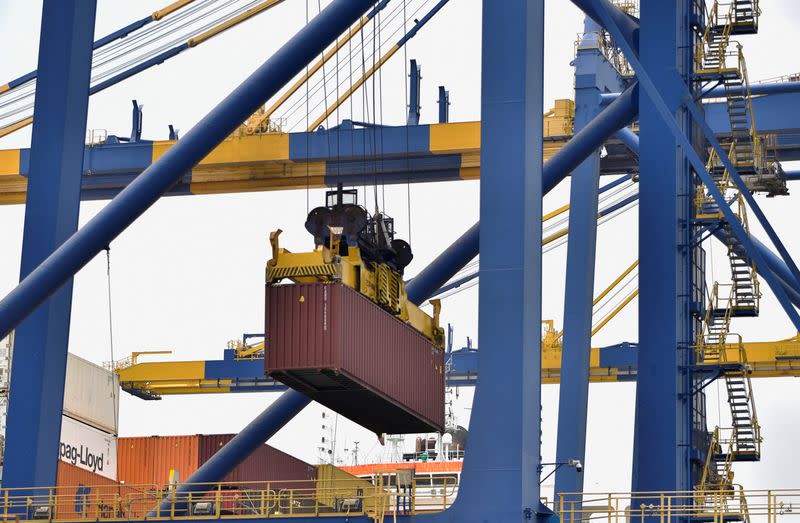 Containers are being transported at the port terminal, in Guayaquil