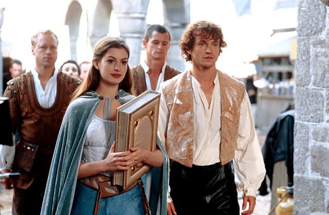 <p>Everett </p> Anne Hathaway and Hugh Dancy in "Ella Enchanted" (2004)