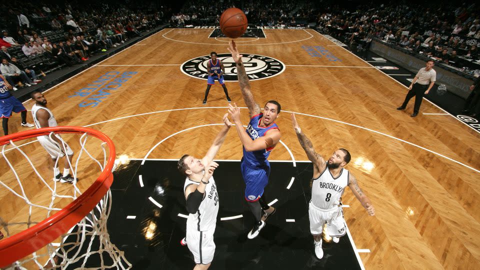 Drew Gordon taking a shot against the Brooklyn Nets while a member of the Philadelphia 76ers on October 20, 2014. - Nathaniel S. Butler/NBAE/Getty Images