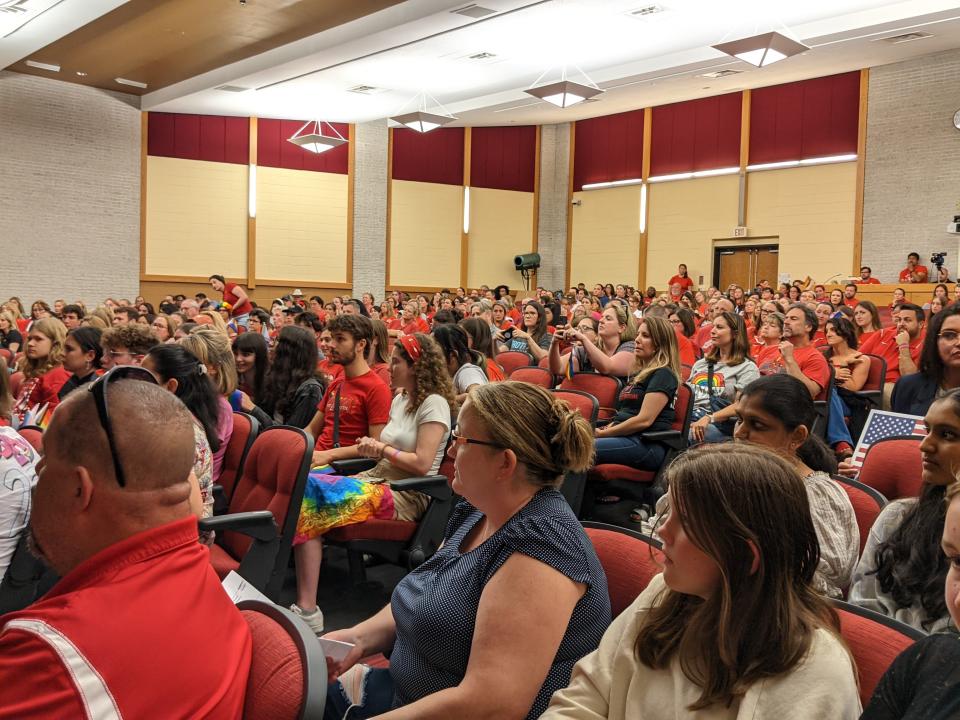 Hundreds pack the auditorium at the Westwood Regional High School in Washington Township with red shirts and pride flags to support Westwood teachers and the LGBTQ community.