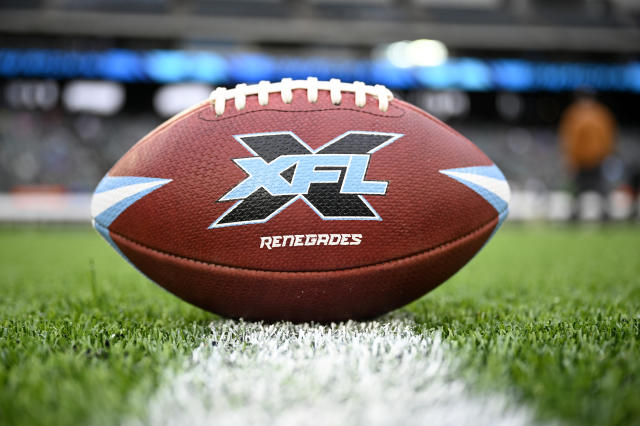 Bankrupt XFL football league bought by group including The Rock