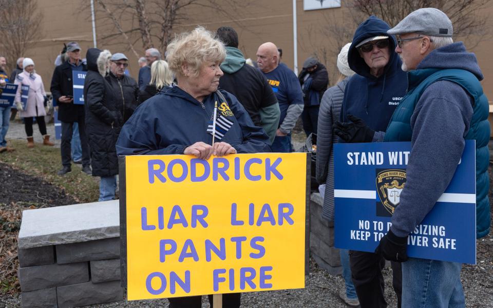 Between 80 and 90 people came out to a protest a proposed ordinance on the agenda for January 31 Township Council meeting that would eliminate two police captains jobs. During rally they were collecting signatures in an effort to invalidate the ordinance.