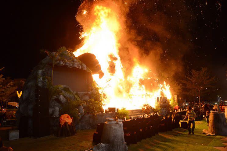 Giant model of King Kong goes up in flames during the premiere of <em>Kong: Skull Island</em> in Ho Chi Minh City, Vietnam, on Thursday. (Photo: STR/AFP/Getty Images)