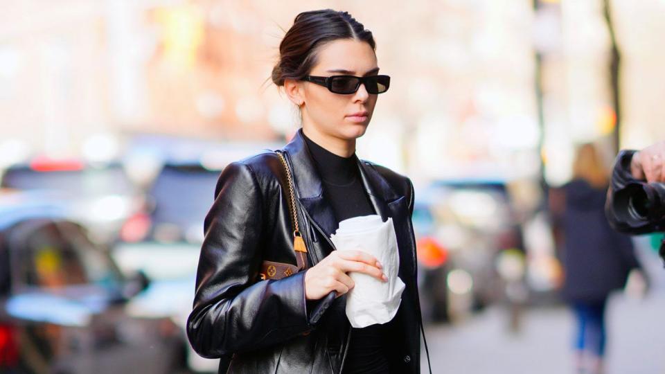 <p>Do we think Kendall Jenner ordered her coffee black to go with her outfit?</p>