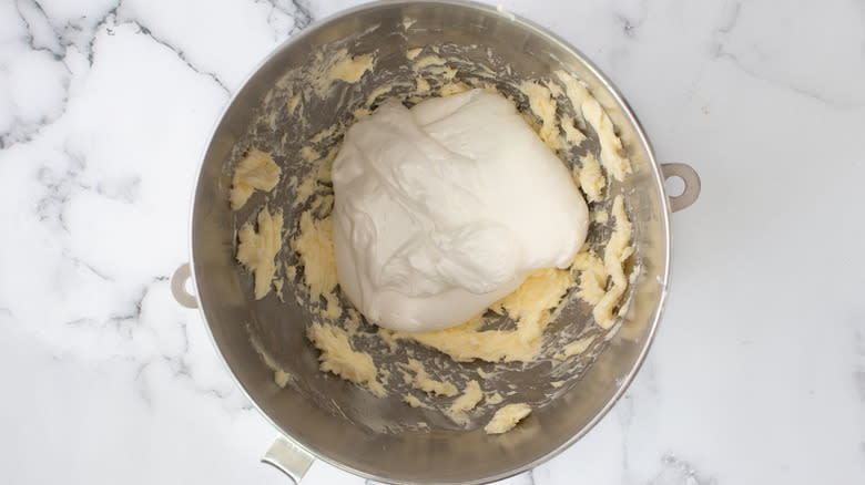 butter and marshmallow fluff in mixing bowl