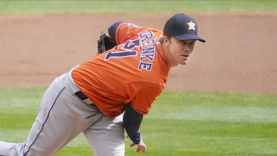 Houston Astros pitcher Zack Greinke throws against the Minnesota Twins in the first inning of an American League playoff baseball game Tuesday, Sept 29, 2020, in Minneapolis. (AP Photo/Jim Mone)