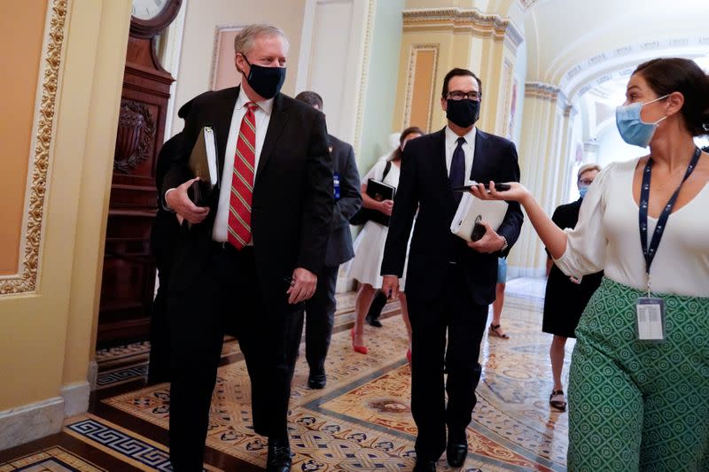 White House Chief of Staff Meadows and U.S. Treasury Secretary Mnuchin walk together in the U.S. Capitol in Washington