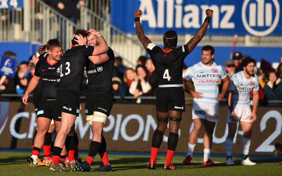 Saracens' players celebrate after defeating Racing 92 - AFP