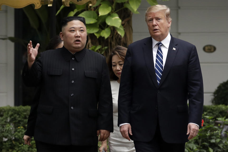 FILE - In this Feb. 28, 2019, file photo, U.S. President Donald Trump, right, and North Korean leader Kim Jong Un take a walk after their first meeting at the Sofitel Legend Metropole Hanoi hotel in Hanoi, Vietnam. North Korea on Saturday, June 13, 2020 again bashed South Korea, telling its rival to stop “nonsensical” talk about its denuclearization and vowing to expand its military capabilities. (AP Photo/Evan Vucci, File)