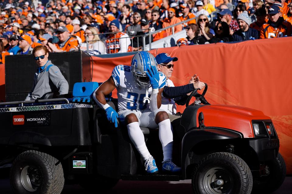 Detroit Lions cornerback Jerry Jacobs (39) is carted off the field in the first quarter against the Denver Broncos at Empower Field at Mile High on Dec. 12, 2021.