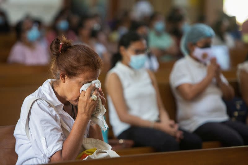 FILE PHOTO: Parishioners attend a mass at Metropolitan Cathedral in Managua