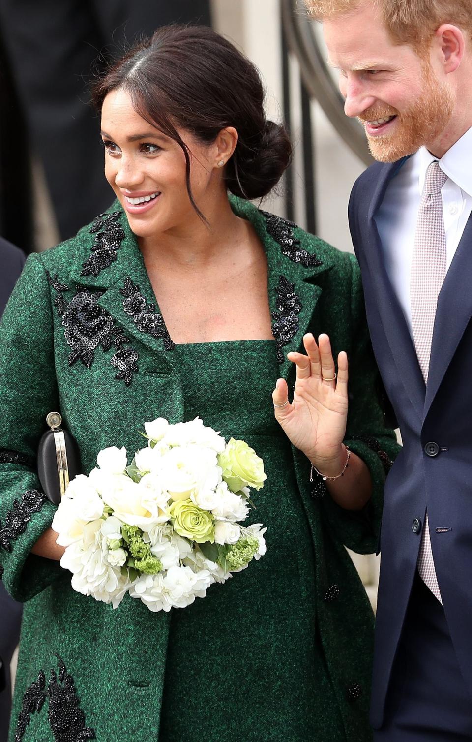 Britain's Prince Harry, Duke of Sussex (R) and Meghan, Duchess of Sussex react as they leave from Canada House, the offices of the High Commission of Canada in the United Kingdom, after attending an event to mark Commonwealth Day, in central London, on March 11, 2019. - Britain's Queen Elizabeth II has been the Head of the Commonwealth throughout her reign. Organised by the Royal Commonwealth Society, the Service is the largest annual inter-faith gathering in the United Kingdom. (Photo by Daniel LEAL-OLIVAS / AFP)        (Photo credit should read DANIEL LEAL-OLIVAS/AFP/Getty Images)