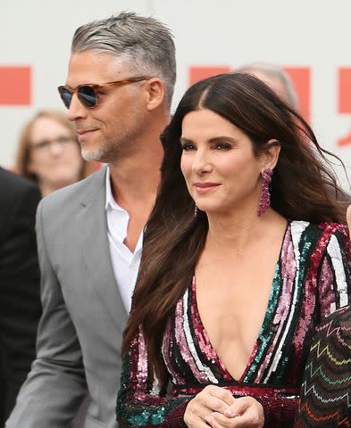 <p>Michael Wright/WENN.com</p> Sandra Bullock and partner Bryan Randall at the London Premiere of <em>Oceans 8</em> on June 13, 2018