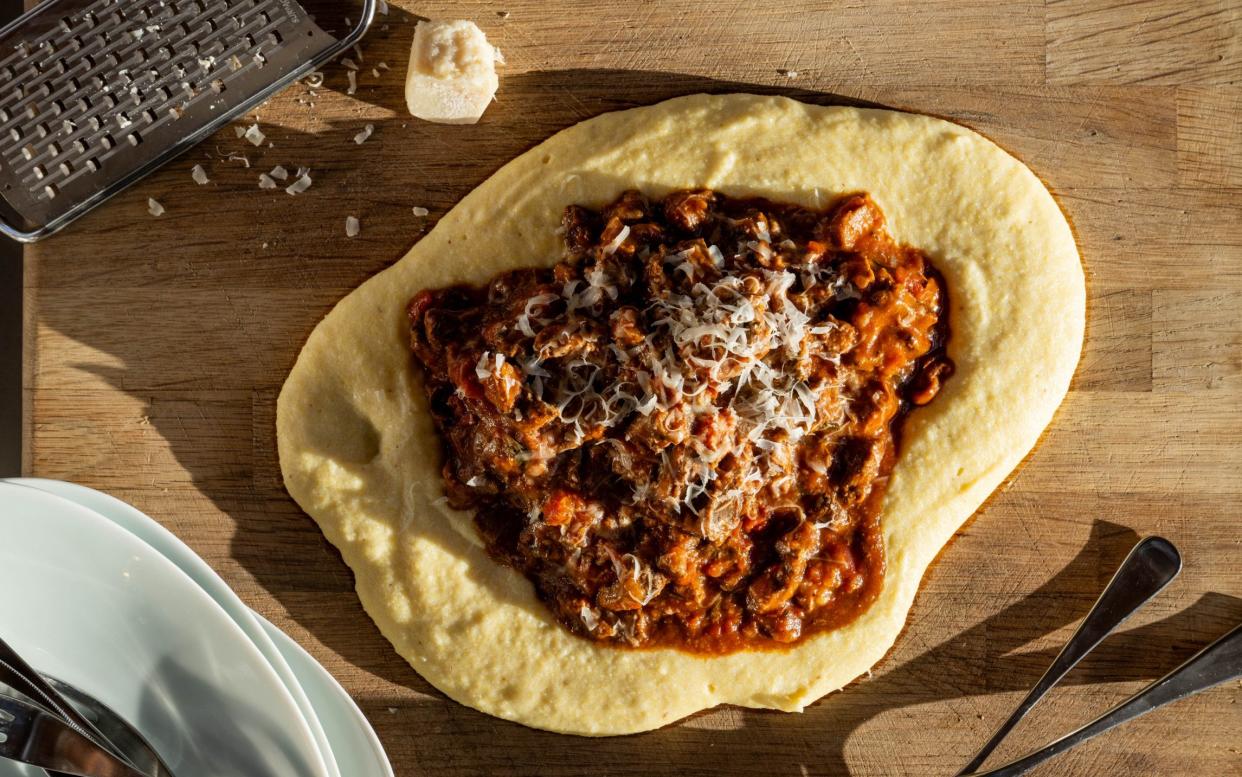 Polenta on the table with beef ragu