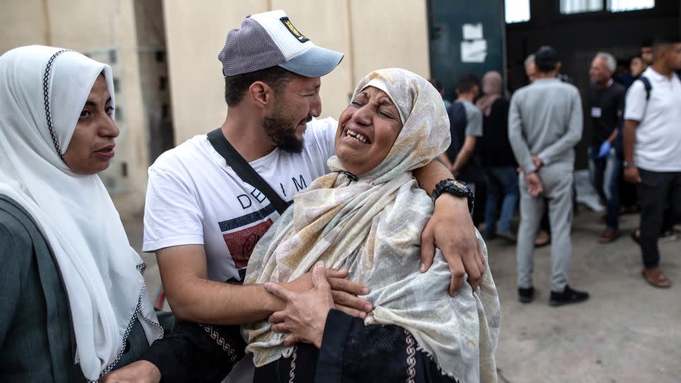 Relatives of those killed mourn on Tuesday morning. - Jehad Alshrafi/Anadolu/Getty Images