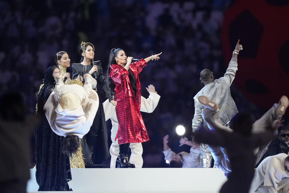 Artists perform during the closing ceremony ahead of the World Cup final soccer match between Argentina and France at the Lusail Stadium in Lusail, Qatar, Sunday, Dec. 18, 2022. (AP Photo/Martin Meissner)